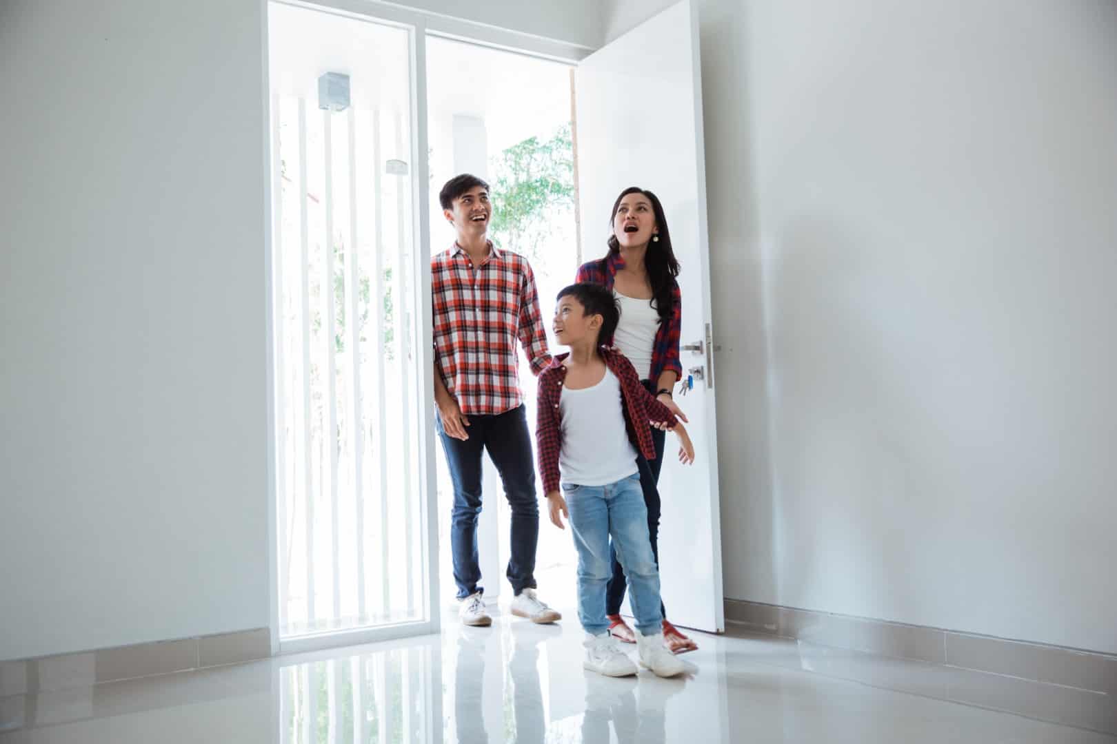 Buyers entering a home